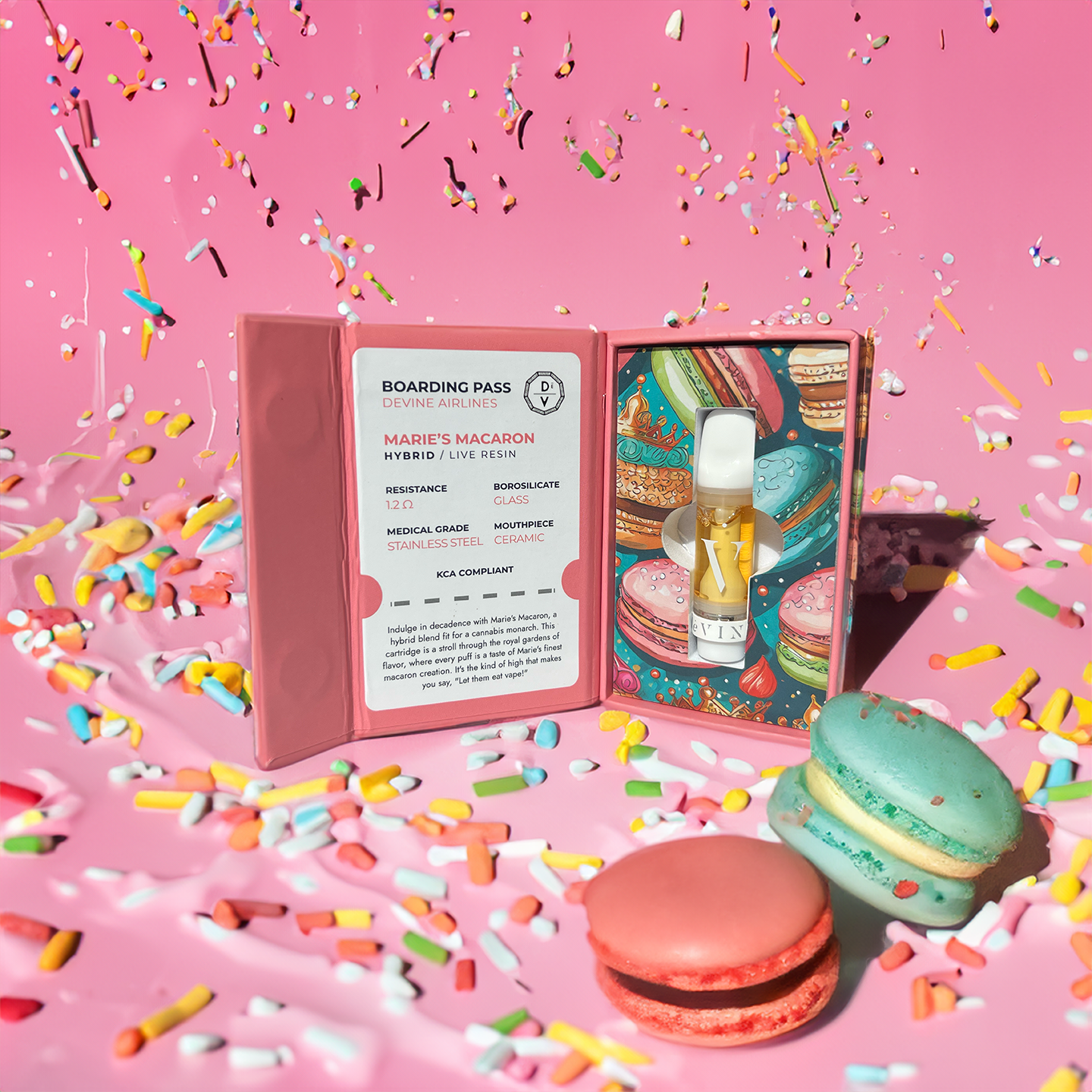 A colorful box of DeVINE Destinations Live Resin THC Cartridge by DeVINE Wellness sits on a pink surface, surrounded by macarons and pastel sprinkles—an eye-catching scene for cannabis connoisseurs.